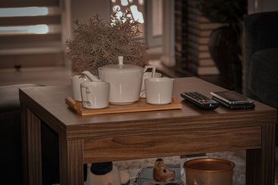 Coffee cup on table at home