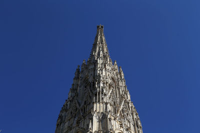 Low angle view of temple against blue sky