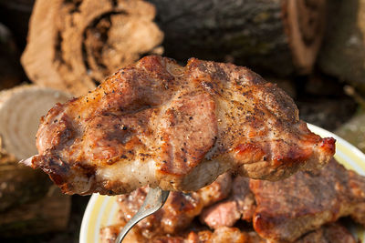 High angle view of meat on barbecue