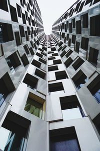 Low angle view of apartment buildings against sky