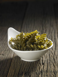 Close-up of fusilli pasta on table