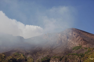 Panoramic view of volcanic mountain against sky