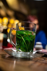 Close-up of tea in glass on table