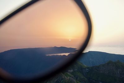 Scenic view of mountains against sky during sunset