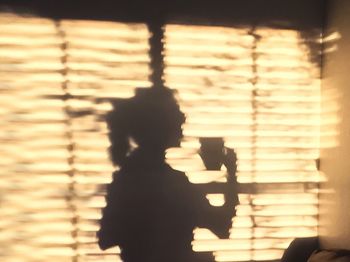 Woman standing on wall