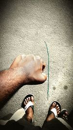 Low section of people standing on floor