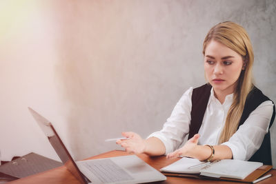 Young woman using mobile phone