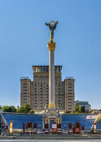 Statue of building against blue sky