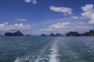 Panoramic view of sea against blue sky