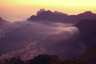 Scenic view of mountains against sky during sunset