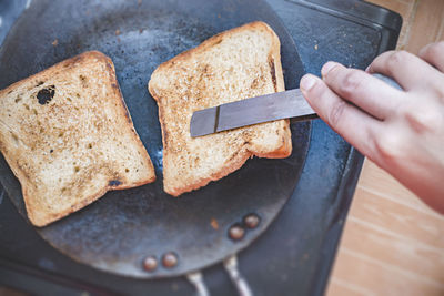 High angle view of man preparing food