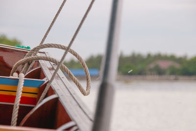 Close-up of rope against boat