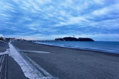 Panoramic view of beach against sky in city