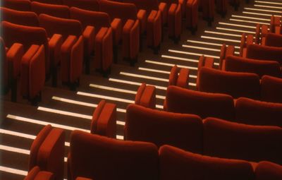 High angle view of empty chairs in movie theater