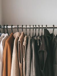 Close-up of clothes hanging on rack