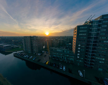 Aerial view of cityscape against sky during sunset. purmerend weidevenne