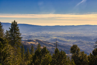 Scenic view of mountains against sky during sunset