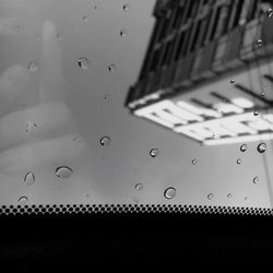 Close-up of wet window in rainy season