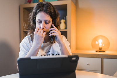 White woman working from home