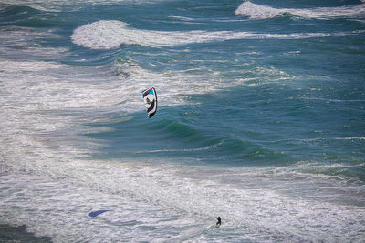 High angle view of person surfing in sea