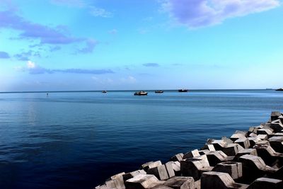 Scenic view of calm sea against clear sky