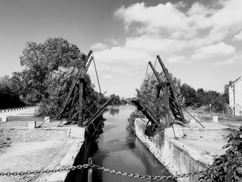 Bridge over river against sky