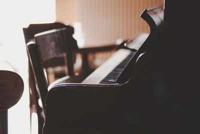 Close-up of piano on table