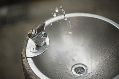 Close-up of water splashing from drinking fountain