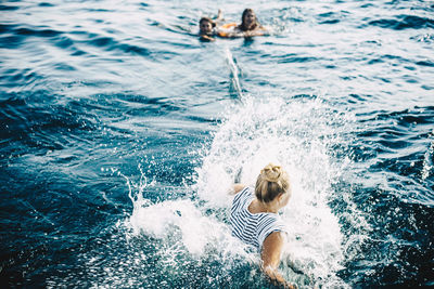 Man swimming in sea