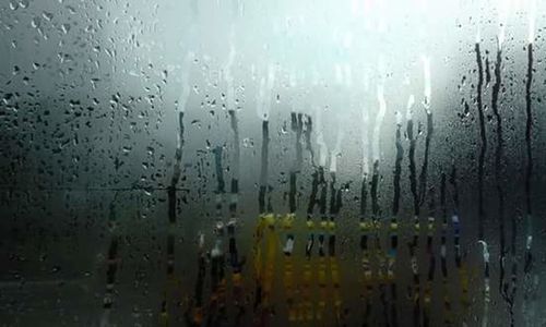 Close-up of wet window during rainy season