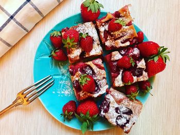 Directly above shot of strawberries in plate on table