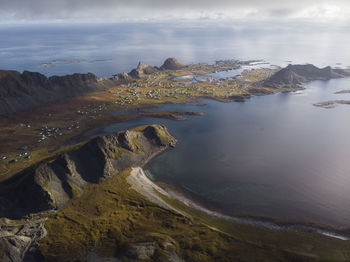 Aerial view of rocks on beach against sky in norway. a small island in the lofoten archipelago