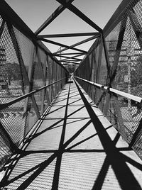 Footbridge against sky