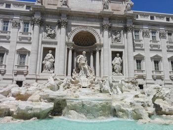 Low angle view of historic trevi fountain