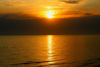 Beautiful calm , silence of the sea at sunset .