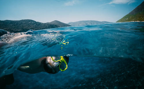 Man swimming in sea