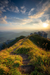 Scenic view of landscape against sky during sunset