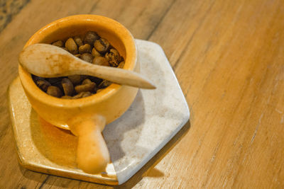 High angle view of fruits in bowl on table