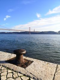 View of bridge over sea against sky