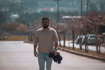 Full length of man walking on street