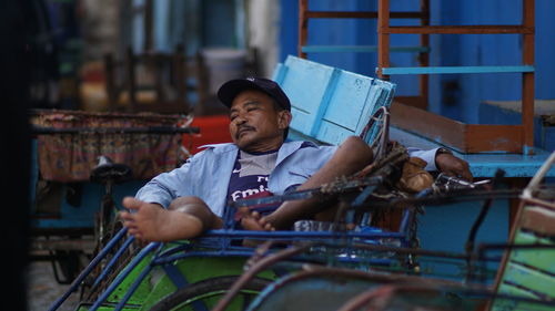 Worker sitting outdoors