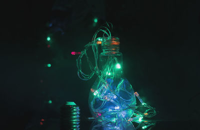 Illuminated christmas lights at night