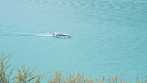 High angle view of ship sailing on sea