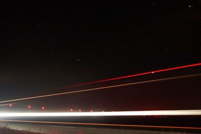 Light trails on road at night