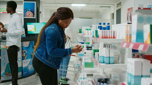 Rear view of man working at laboratory