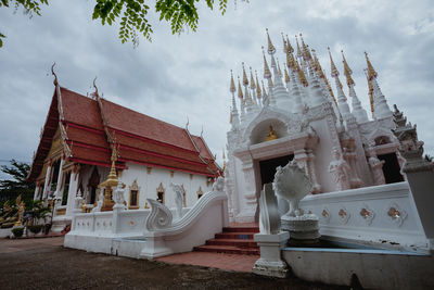 Low angle view of statue against building