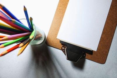 Directly above shot of colored pencils on table