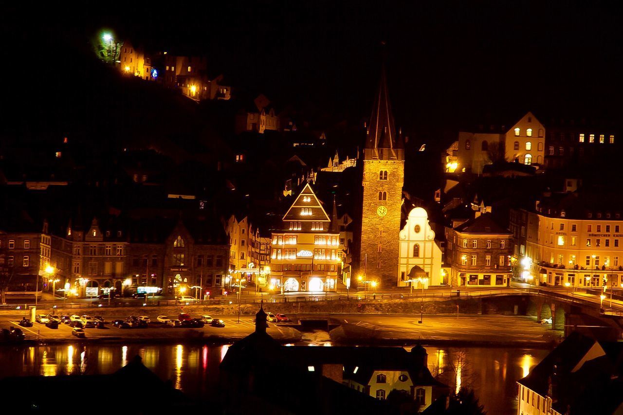 ILLUMINATED BUILDINGS AT NIGHT