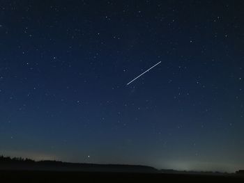 Low angle view of star field against sky at night