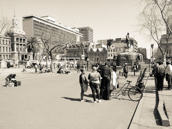 People walking on city street